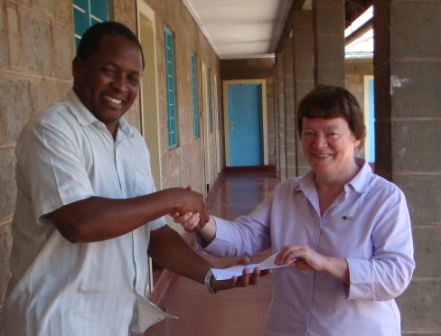 Handing over a donation from St Mary&rsquo;s Parish